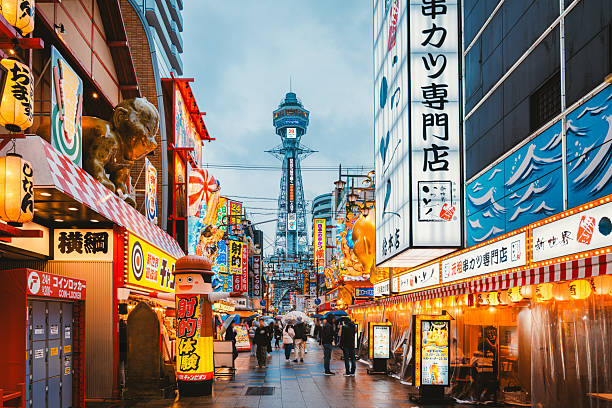 Color signs and Tsutenkaku Tower in Osaka